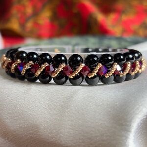 Hand Crafted Onyx bracelet adorned with Czech red beads and gold tone seed beads
